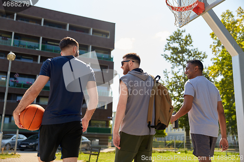 Image of group of male friends going to play basketball