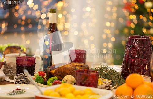 Image of food and drinks on christmas table at home