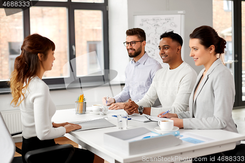 Image of recruiters having job interview with employee