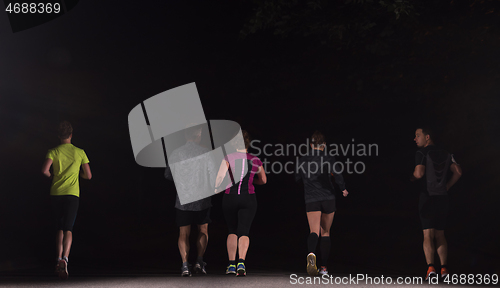 Image of runners team on the night training