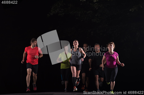 Image of runners team on the night training