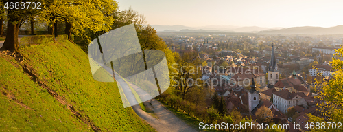 Image of Panoramic view of Ljubljana, capital of Slovenia. Roooftops of Ljubljanas old medieval city center seen from Ljubljanas castle park at sunset