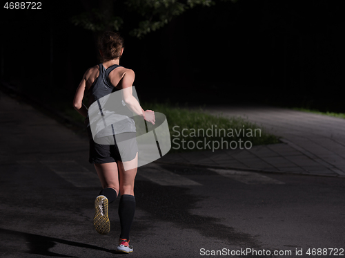 Image of female runner training for marathon