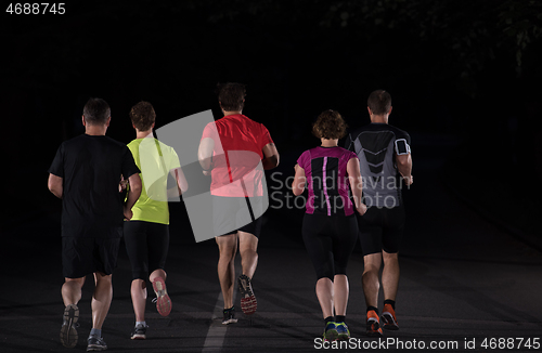 Image of runners team on the night training