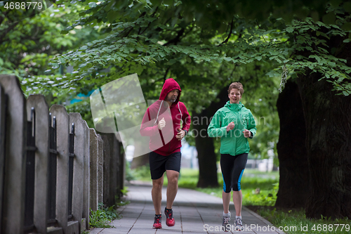 Image of jogging couple on morning training