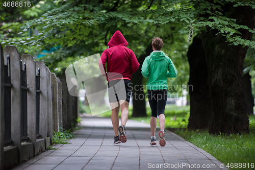 Image of jogging couple on morning training