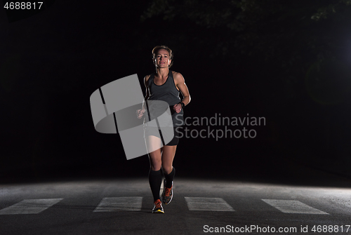 Image of female runner training for marathon