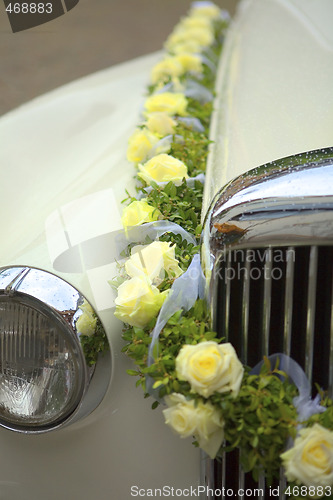 Image of Wedding Car with yellow flowers