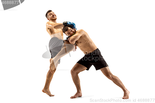 Image of Two professional boxers boxing isolated on white studio background