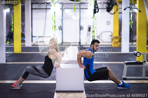 Image of athletes working out their arms