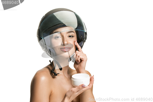 Image of Portrait of attractive woman in motorbike helmet