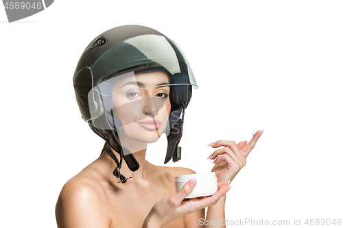 Image of Portrait of attractive woman in motorbike helmet