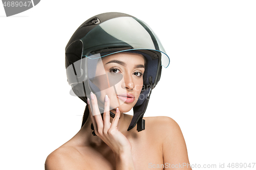 Image of Portrait of attractive woman in motorbike helmet