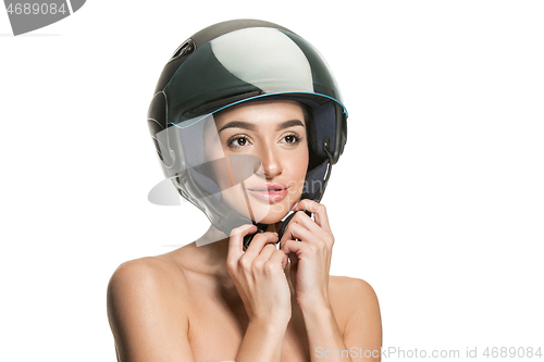 Image of Portrait of attractive woman in motorbike helmet