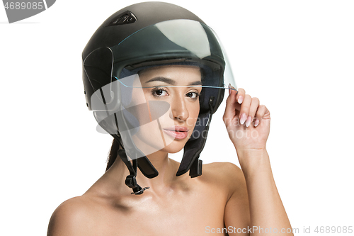 Image of Portrait of attractive woman in motorbike helmet