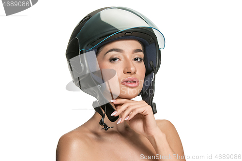 Image of Portrait of attractive woman in motorbike helmet