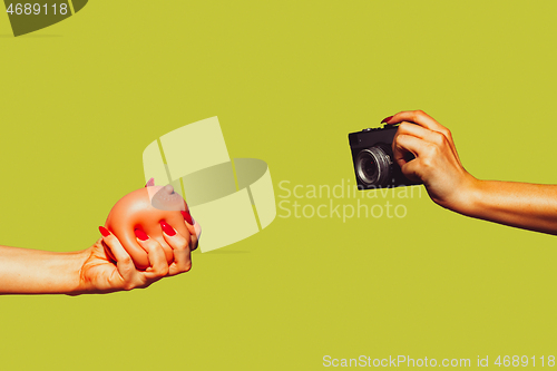 Image of Modern art collage in pop-art style. Hands isolated on trendy colored background with copyspace, contrast