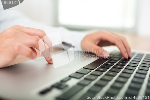 Image of Woman using computer