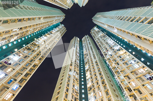 Image of Apartment building to the sky at night