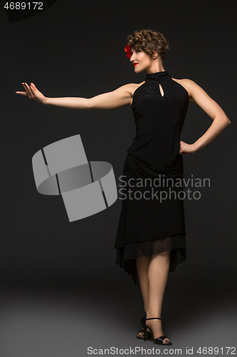 Image of girl dancer in tango dress