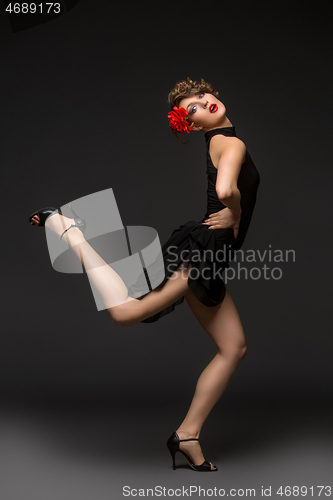 Image of girl dancer in tango dress