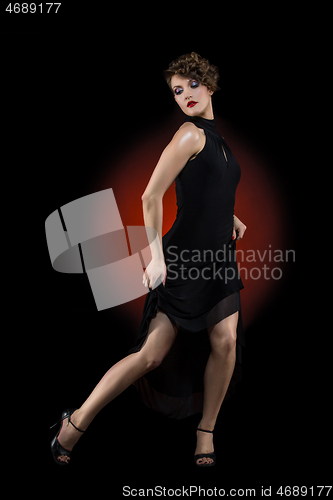 Image of girl dancer in tango dress