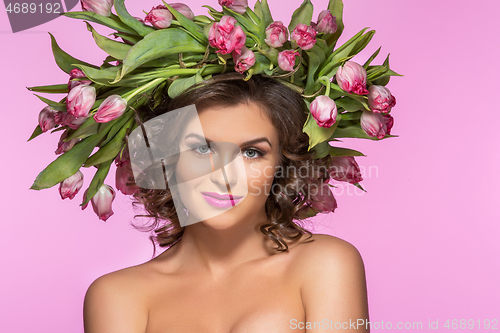 Image of beautiful girl with flower tulip wreath