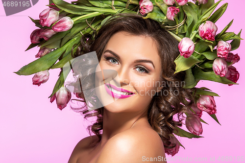 Image of beautiful girl with flower tulip wreath