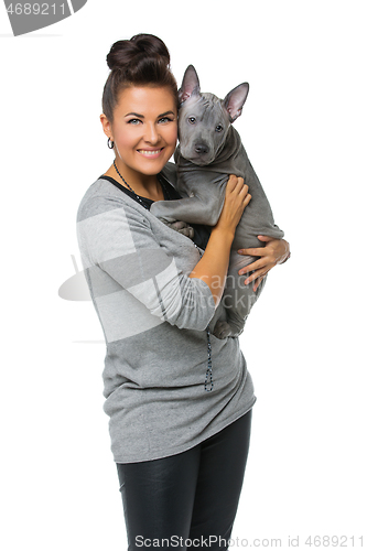 Image of girl with thai ridgeback puppy