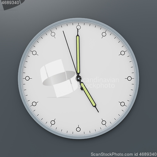 Image of a clock shows five o\'clock