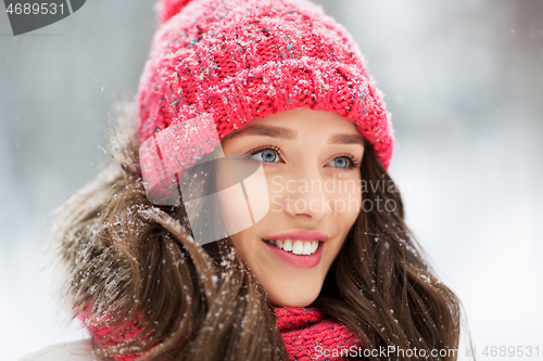 Image of smiling teenage girl outdoors in winter