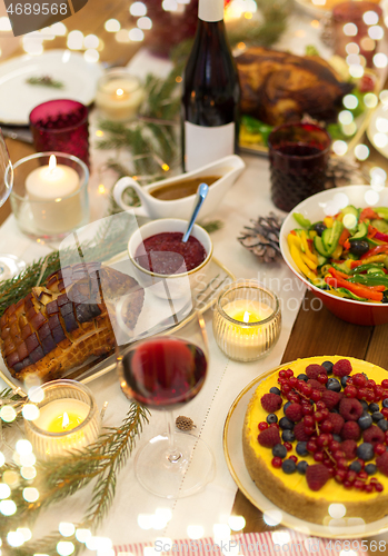 Image of food and drinks on christmas table at home