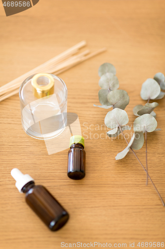 Image of aroma reed diffuser, essential oil and eucalyptus