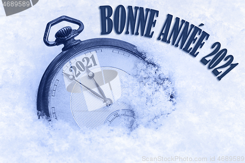 Image of Bonne Annee, Happy New Year 2021 greeting in French language, text, greeting card 2021, countdown to midnight