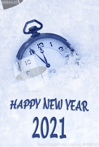 Image of Happy New year 2021, 2021 New Year greeting card  in English language, pocket watch in snow, countdown to midnight