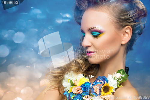 Image of beautiful girl with flower accessories