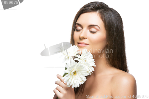 Image of beautiful girl with white flowers