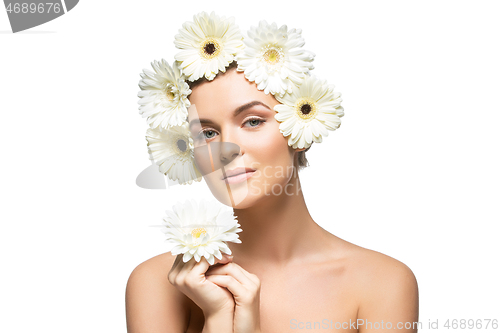 Image of beautiful girl with white flowers on head