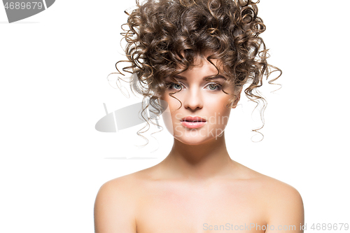 Image of beautiful girl with curly hairdo