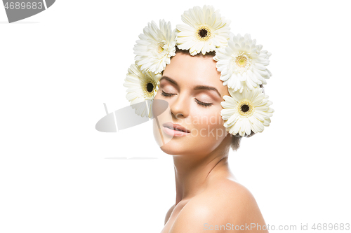 Image of beautiful girl with white flowers on head