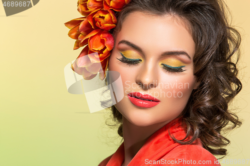 Image of beautiful girl in orange dress