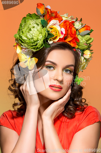 Image of beautiful girl in orange dress