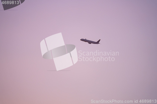 Image of plane sunset haze