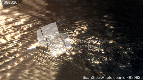 Image of golden water sunset surface background