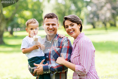 Image of happy family at summer park