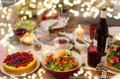 Image of food and drinks on christmas table at home