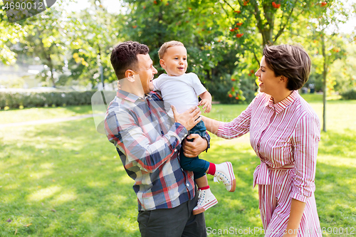 Image of happy family at summer park