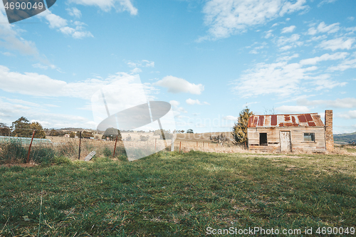 Image of Old rustic timber homestead with rusting corrugated iron roof