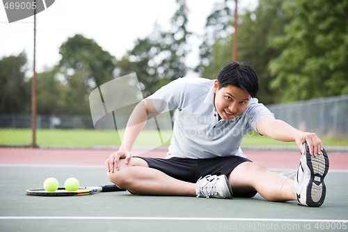 Image of Asian tennis player