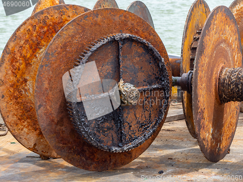 Image of Rusty, old winch drums